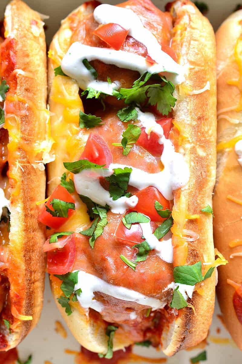 These Enchilada Meatball Subs combine two family favorites in one delicious dish that's easy to make and perfect for busy weeknights or game days!