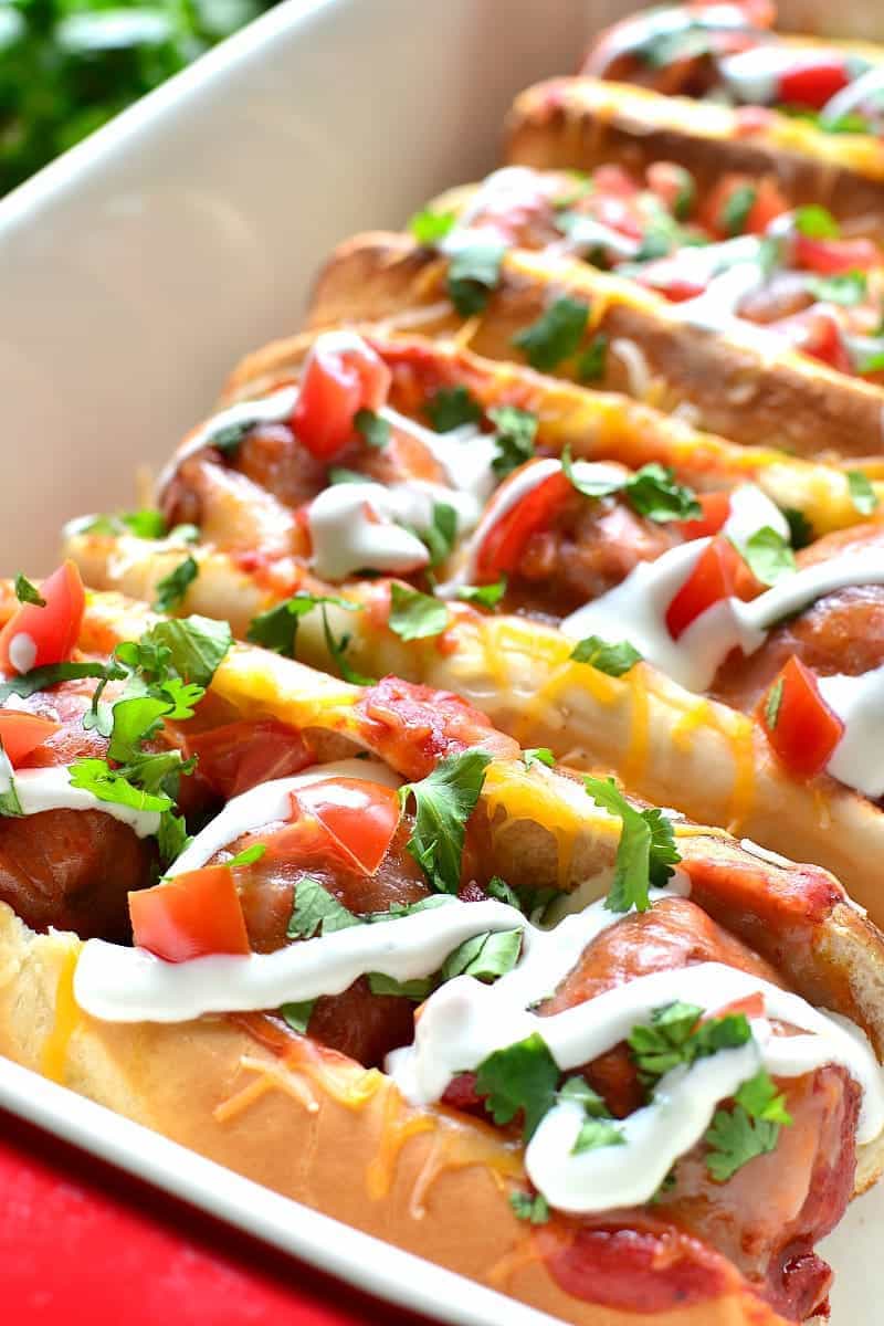 These Enchilada Meatball Subs combine two family favorites in one delicious dish that's easy to make and perfect for busy weeknights or game days!