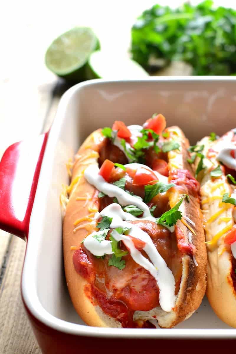 These Enchilada Meatball Subs combine two family favorites in one delicious dish that's easy to make and perfect for busy weeknights or game days!