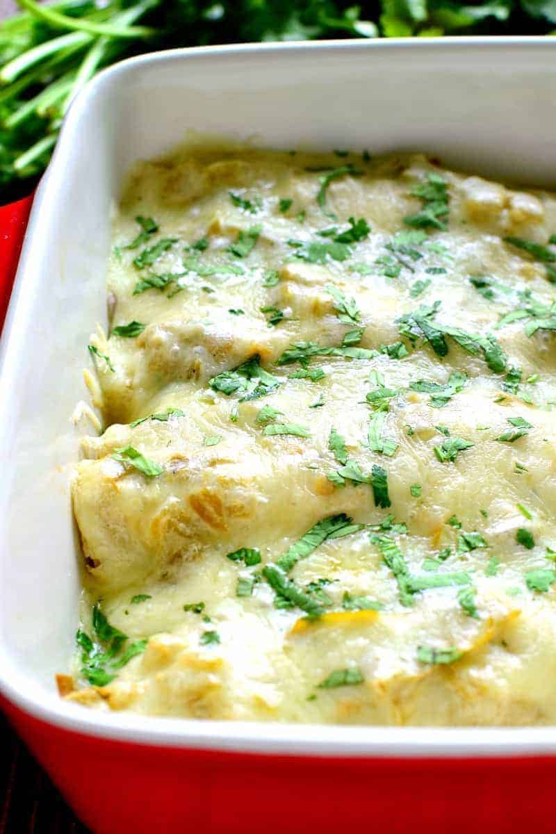 These Roasted Vegetable Enchiladas are packed with fresh veggies, corn, and black beans, then topped with a creamy chile verde sauce and melted Monterey Jack cheese. The perfect option for a healthy, flavor packed, meatless dinner!