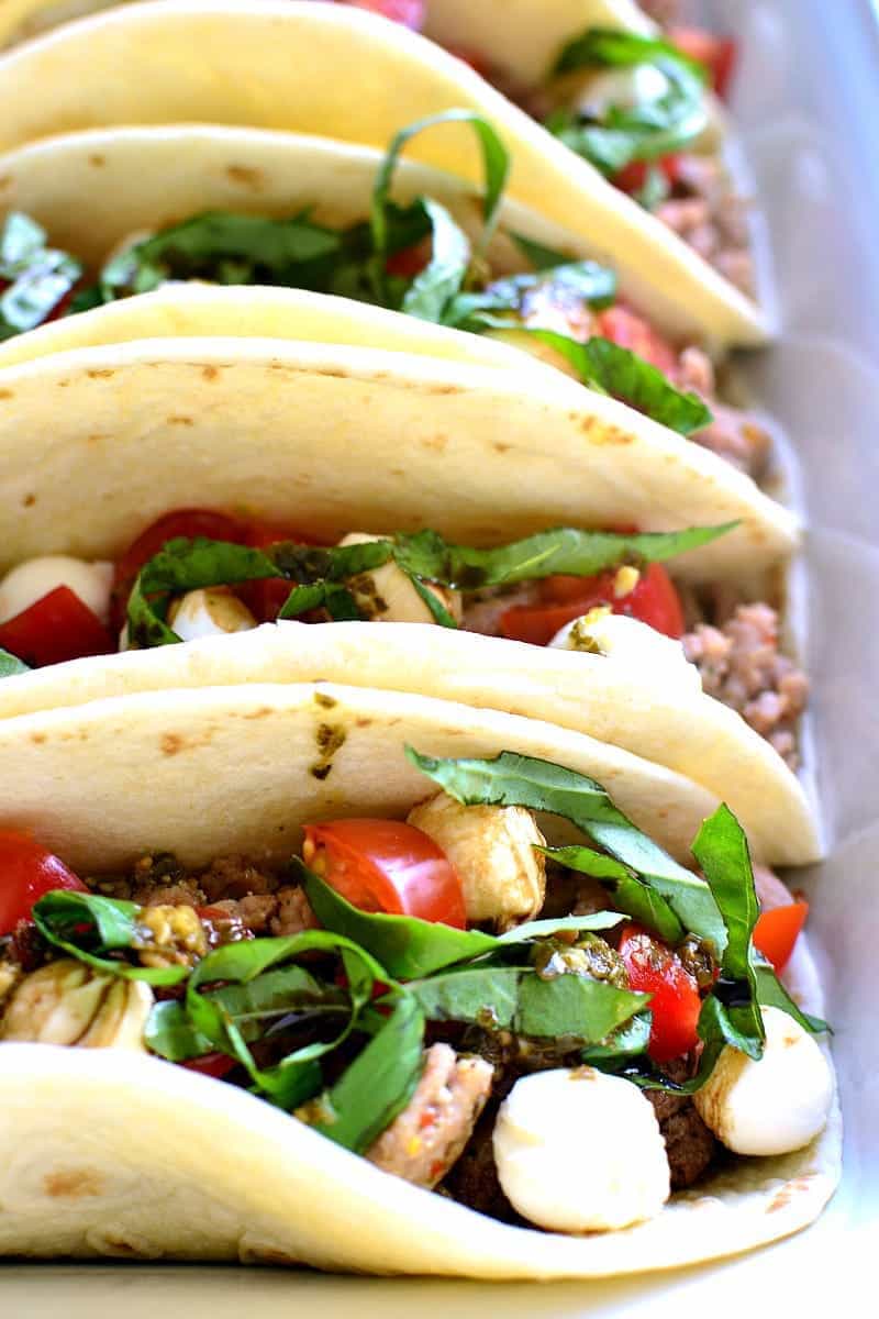 Italian tacos made with fresh basil, tomatoes, and mozzarella cheese