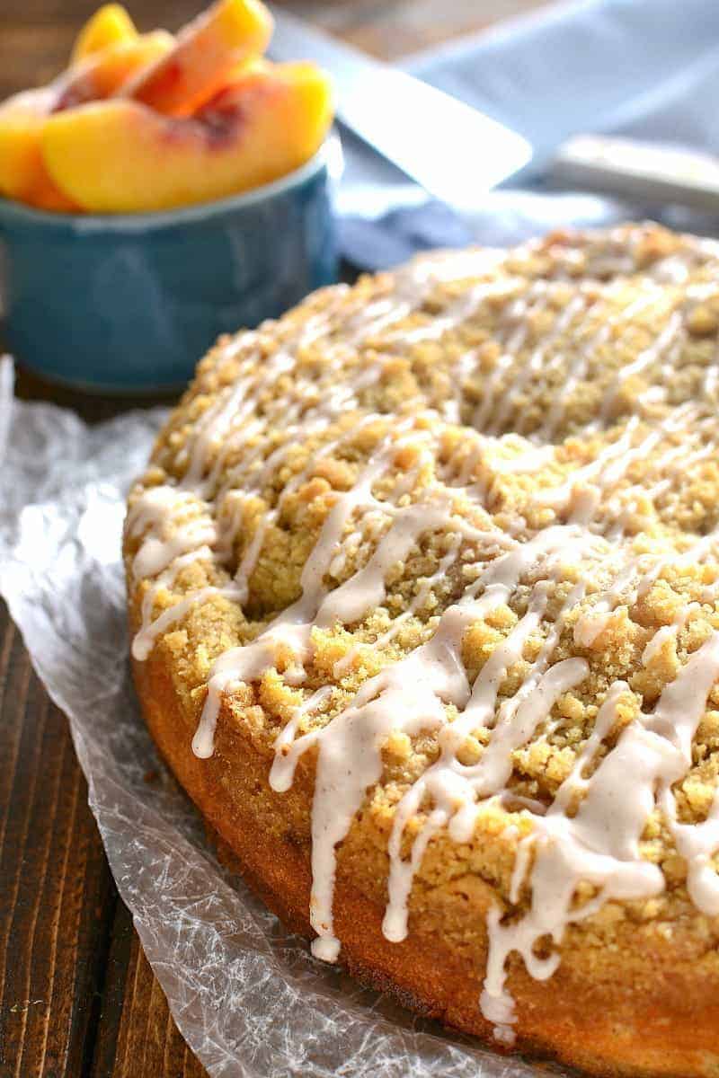 Peach Cobbler Coffee Cake topped with sweet cinnamon drizzle