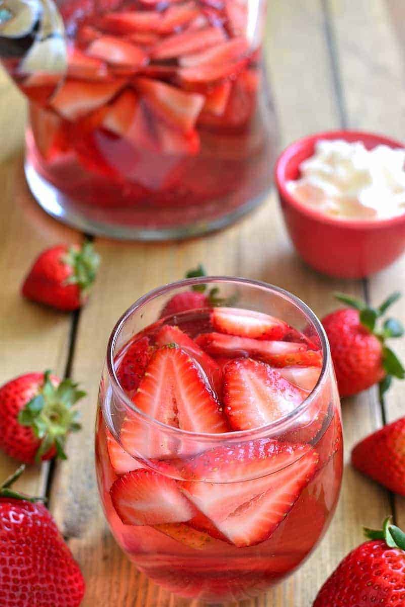 overhead image of a glass filled with strawberry shortcake sangria