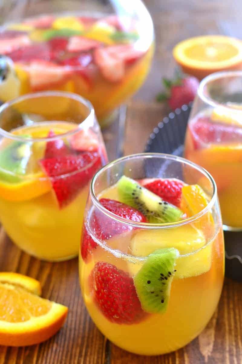 glasses filled with Tropical Fruit White Wine Sangria