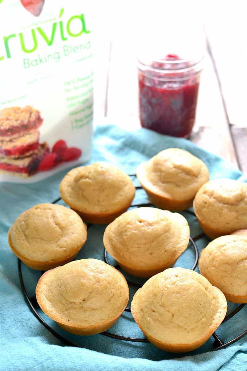 8 Very Vanilla Muffins tucked into a blue linen napkin