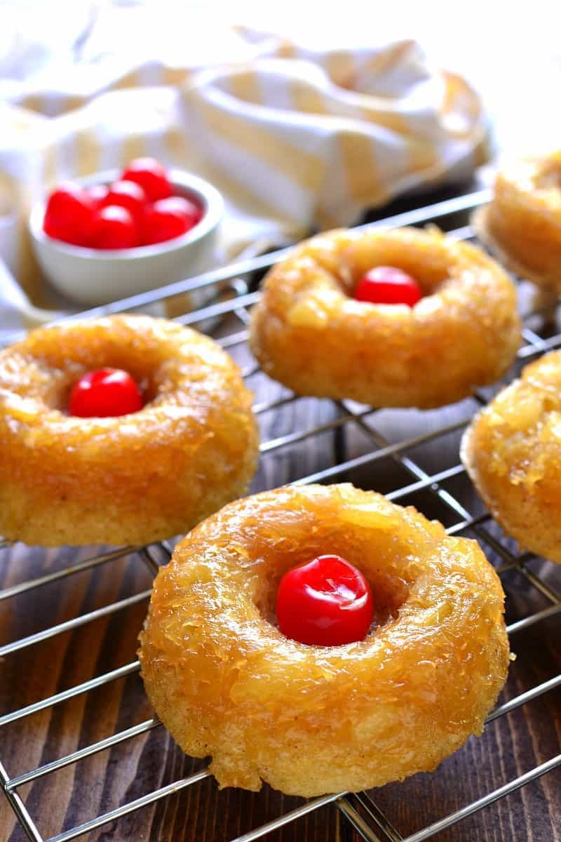 Pineapple Upside Down Donuts taste just like the cake, in donut form! These baked donuts are moist & cake-like with a sweet pineapple brown sugar topping. Delicious for breakfast, or try them warm with a scoop of ice cream on top for dessert!