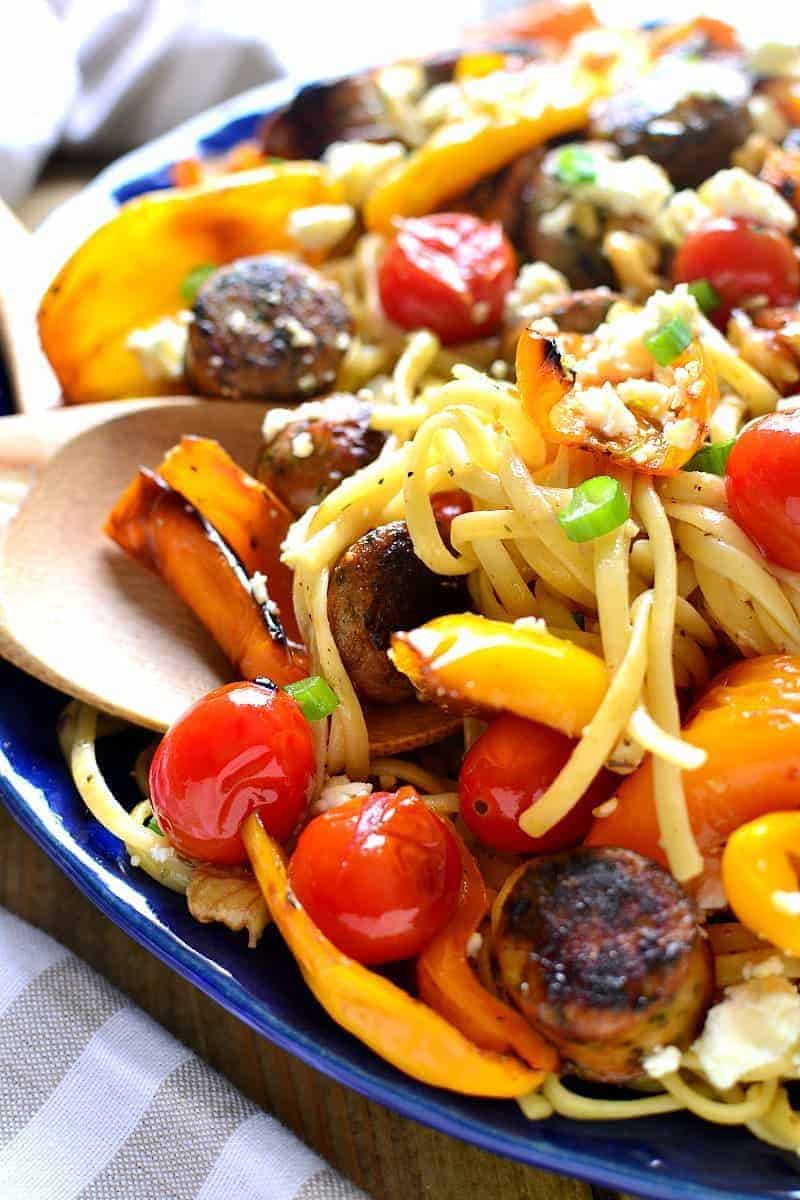 This Sausage & Pepper Linguine is chock full of vegetables and bursting with delicious flavor! Have it on the table in 30 minutes or less....this dish is perfect for busy nights and guaranteed to become a family favorite!