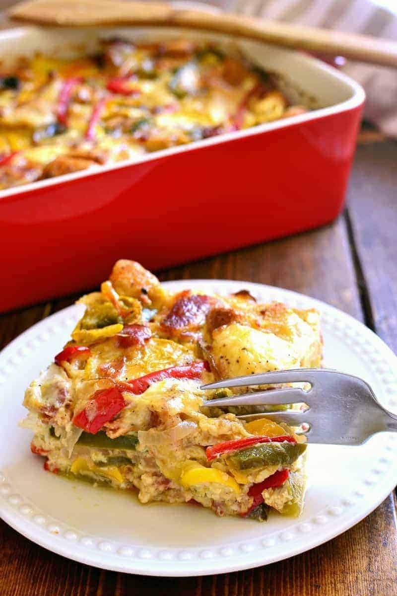 This Summer Vegetable Breakfast Strata is loaded with fresh summer vegetables, crusty bread, two types of cheese, and crispy bacon. Perfect for any special occasion - this is one of our favorites!