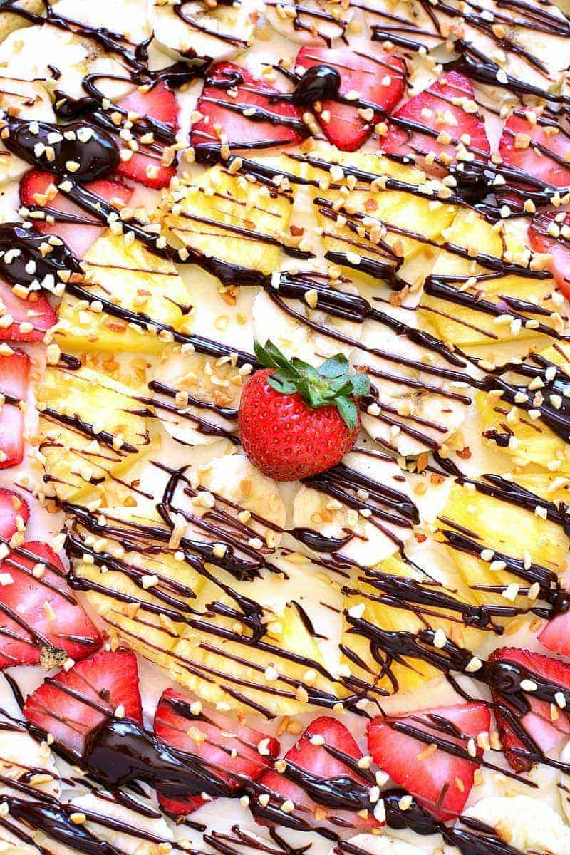 This Banana Split Fruit Pizza combines two favorites in one delicious dessert that's easy to prepare and sure to be a hit!