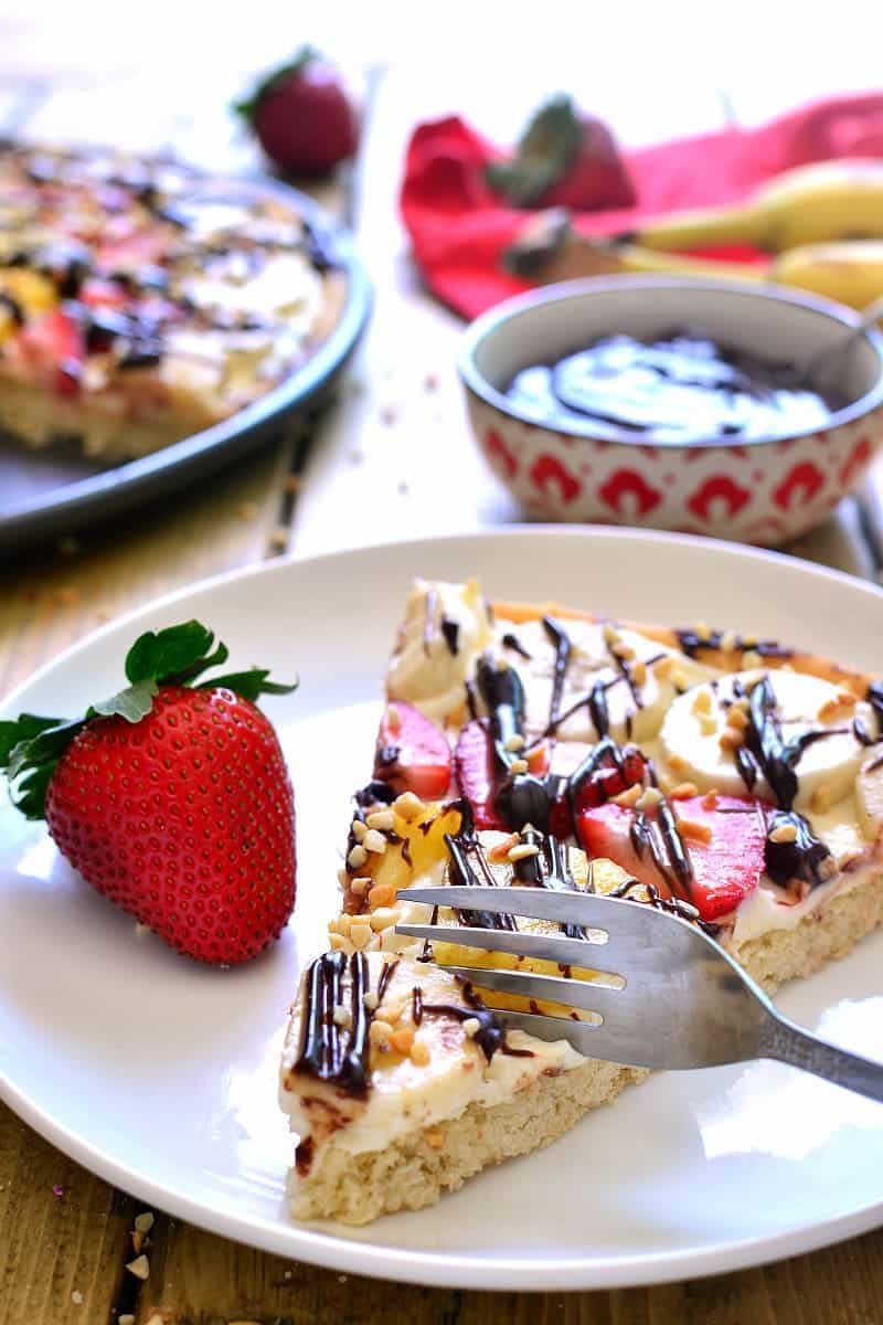 This Banana Split Fruit Pizza combines two favorites in one delicious dessert that's easy to prepare and sure to be a hit!