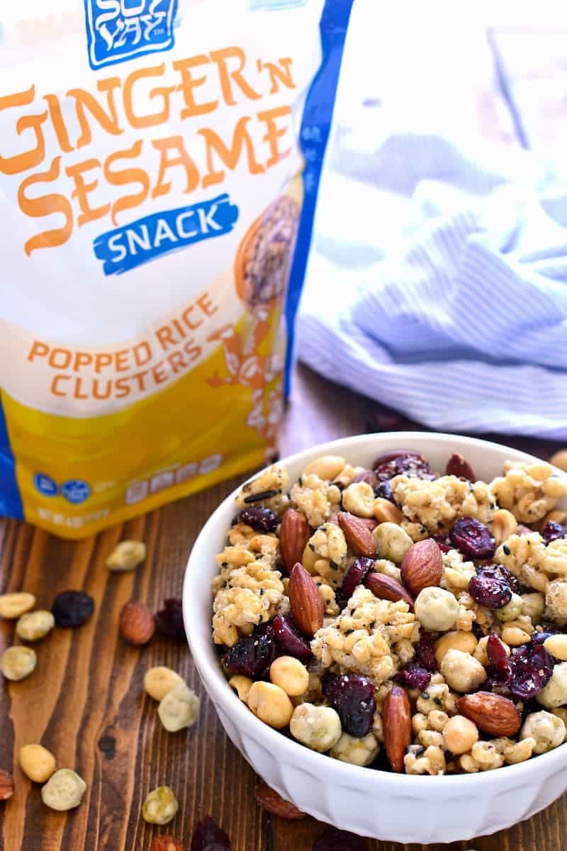 This Ginger Sesame Snack Mix combines the delicious flavors of sesame and ginger with roasted almonds, wasabi peas, salted peanuts, and dried cranberries. An unexpected blend of savory and sweet, this snack mix is bold, crunchy, and so addictive!