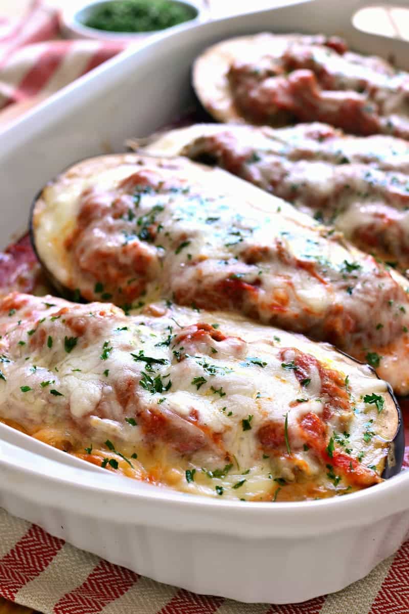 Lasagna Stuffed Eggplant makes the most of fresh summer produce by combining two classics in one delicious dish. Baked eggplant meets creamy lasagna and the result is pure comfort food that's perfect for summer!