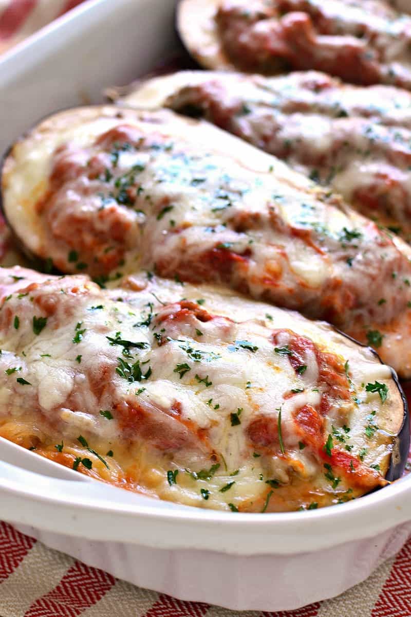 Lasagna Stuffed Eggplant makes the most of fresh summer produce by combining two classics in one delicious dish. Baked eggplant meets creamy lasagna and the result is pure comfort food that's perfect for summer!