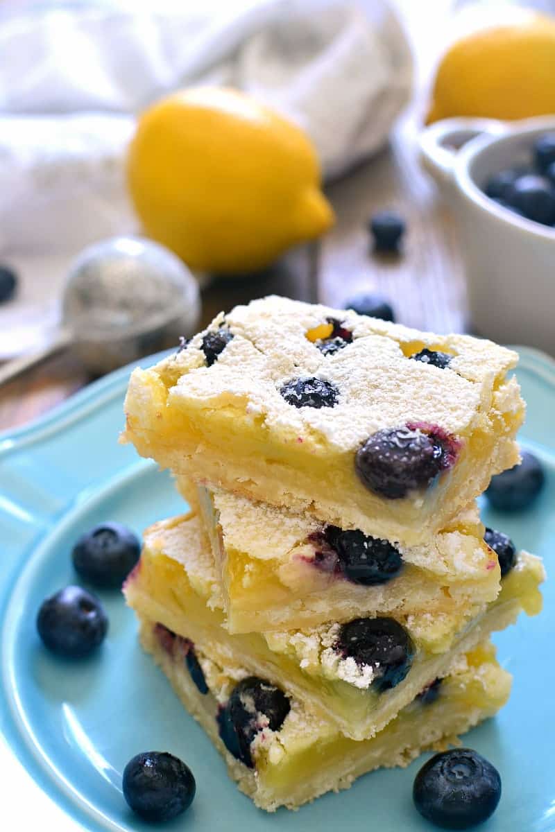 These Blueberry Lemon Bars take the classic bars to the next level with the addition of fresh blueberries! Deliciously sweet and perfect for summer!