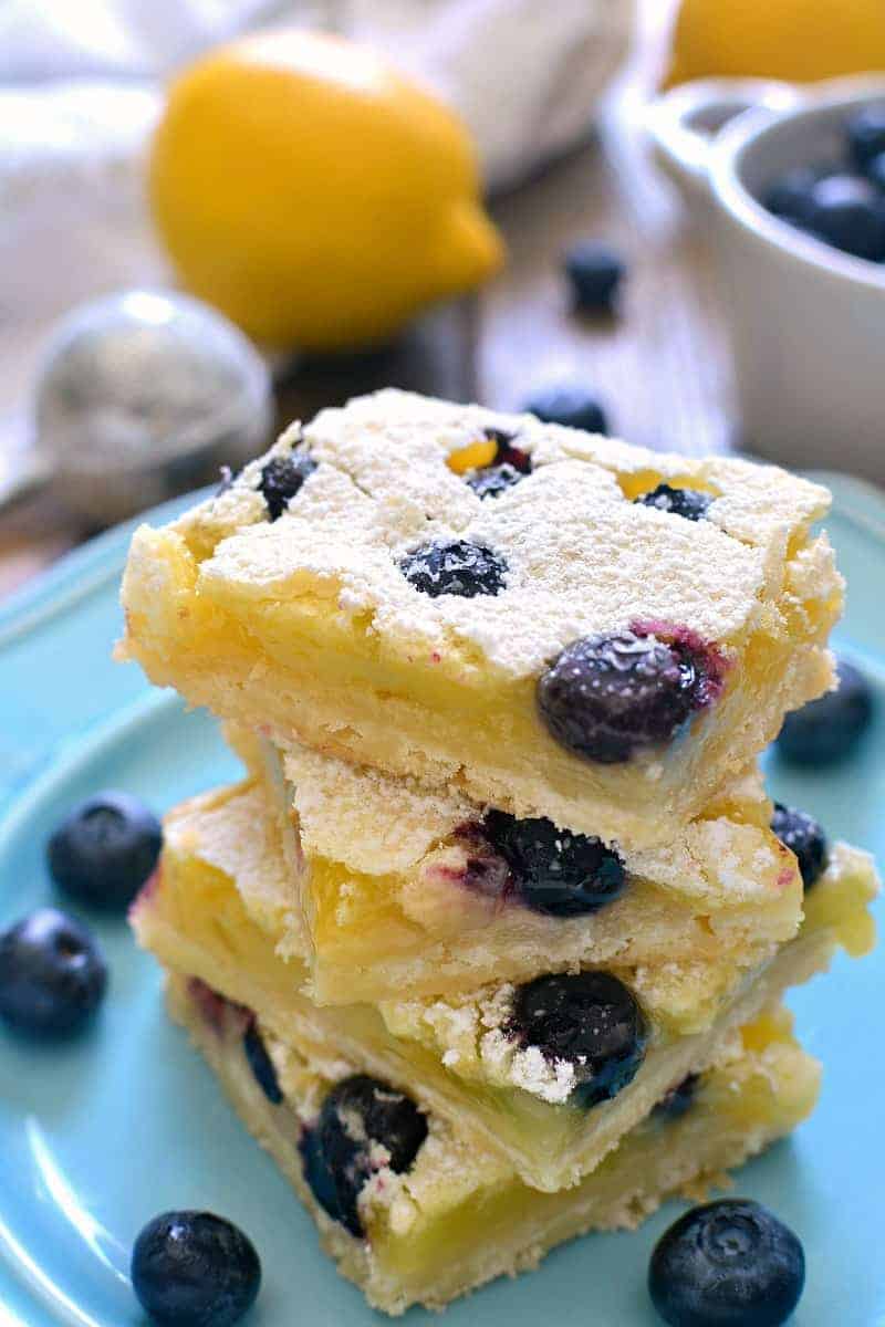 These Blueberry Lemon Bars take the classic bars to the next level with the addition of fresh blueberries! Deliciously sweet and perfect for summer!