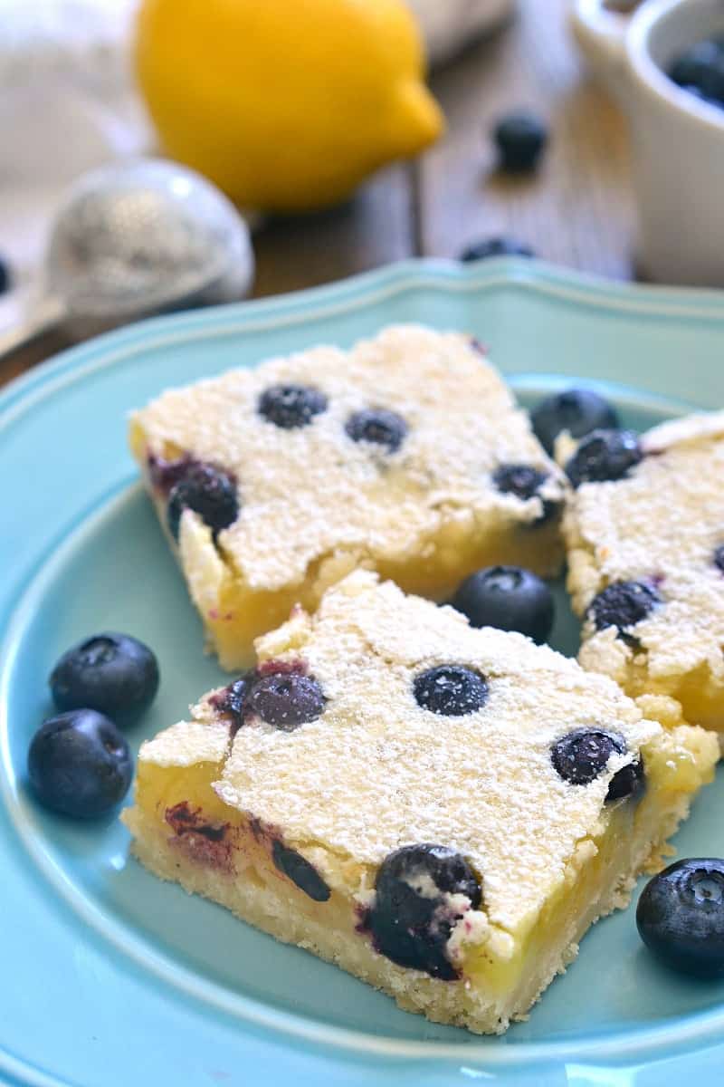 These Blueberry Lemon Bars take the classic bars to the next level with the addition of fresh blueberries! Deliciously sweet and perfect for summer!