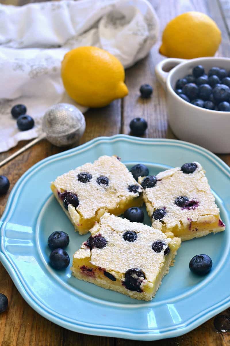 These Blueberry Lemon Bars take the classic bars to the next level with the addition of fresh blueberries! Deliciously sweet and perfect for summer!