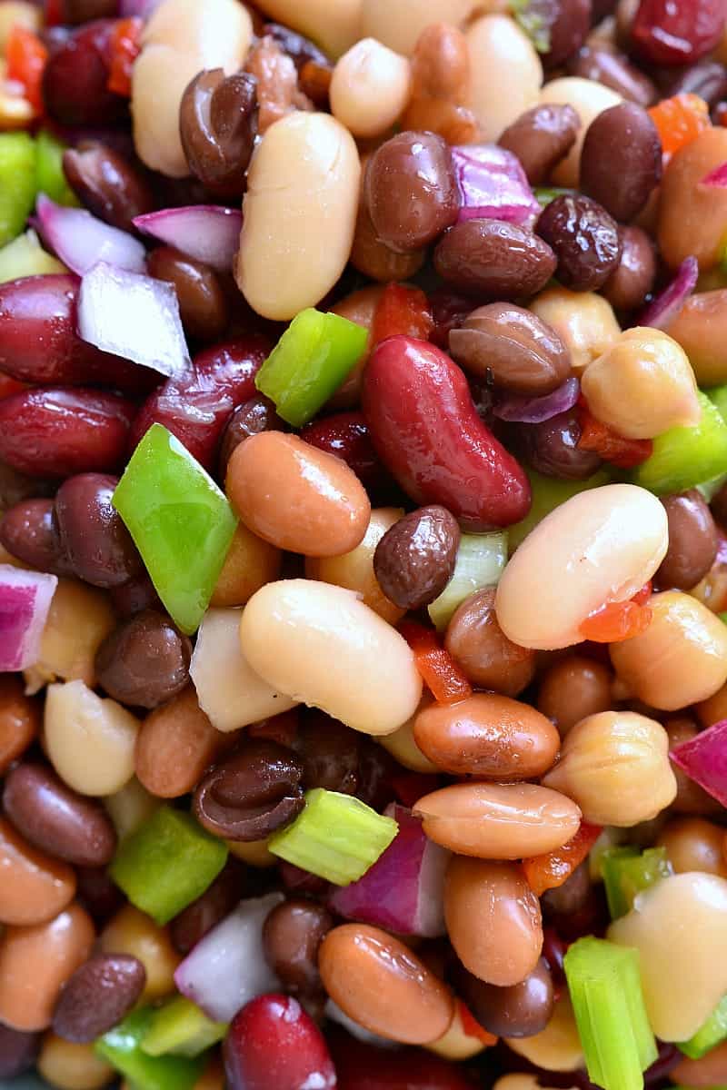 This 5-Bean Salad combines black, pinto, garbanzo, cannellini, and kidney beans with green peppers, pimentos, and red onions in a sweet dressing that ties it all together in the most delicious way!
