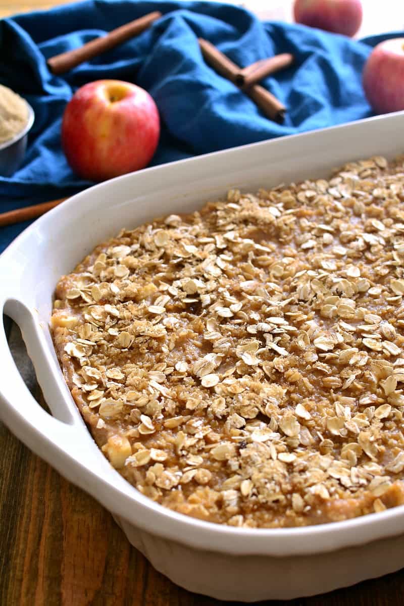 Apple Cinnamon Baked Oatmeal is loaded with fresh apples, cinnamon, and brown sugar, then baked to creamy perfection. Perfect for busy weekday mornings....just in time for back to school!