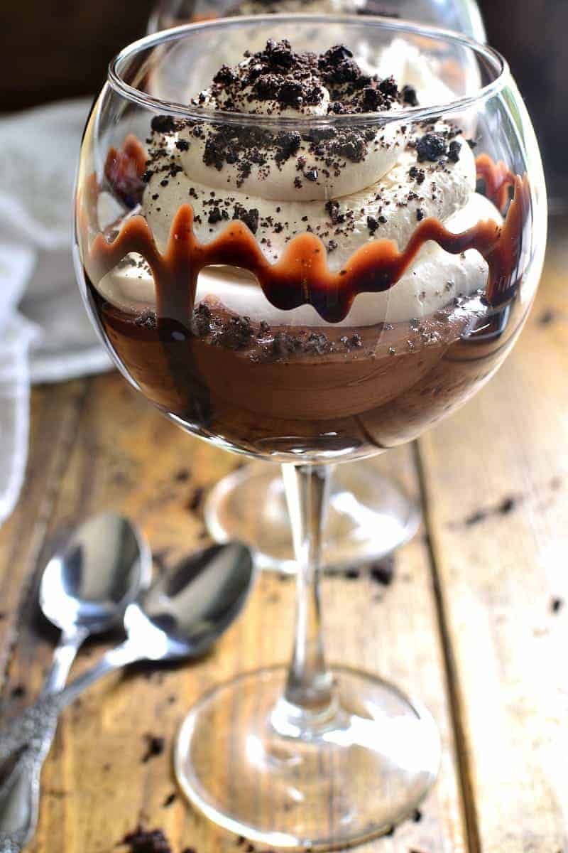 These Mudslide Parfaits have all the flavors of a mudslide cocktail in one decadent dessert! Perfect for date night, ladies night, or a special occasion, these parfaits are SO delicious you'll be licking your glass clean!