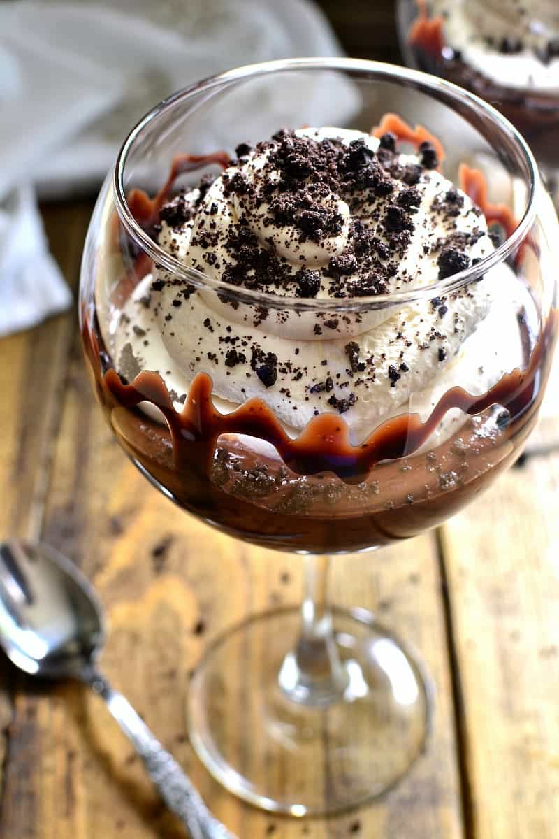 These Mudslide Parfaits have all the flavors of a mudslide cocktail in one decadent dessert! Perfect for date night, ladies night, or a special occasion, these parfaits are SO delicious you'll be licking your glass clean!