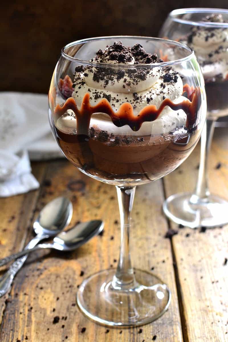 These Mudslide Parfaits have all the flavors of a mudslide cocktail in one decadent dessert! Perfect for date night, ladies night, or a special occasion, these parfaits are SO delicious you'll be licking your glass clean!