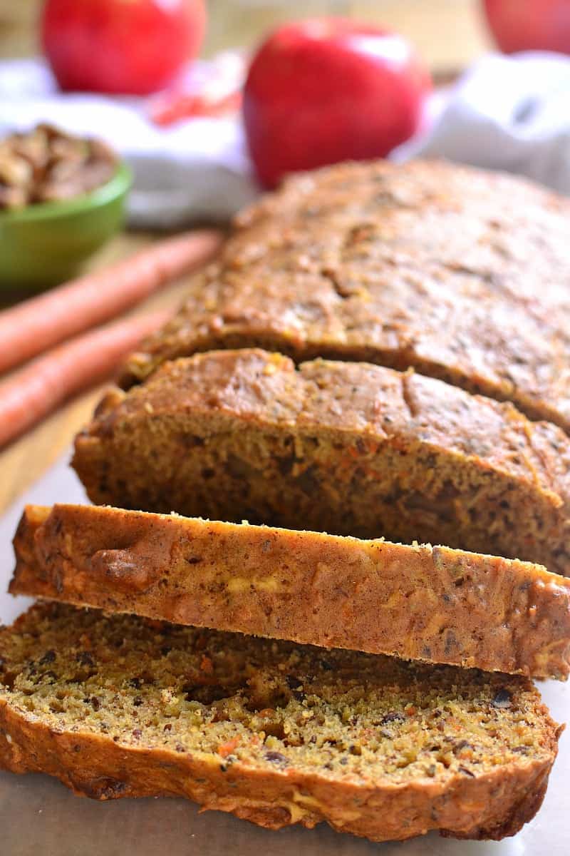 This Carrot Apple Bread is packed with flavor and perfect for fall! Loaded with fresh apples, carrots, walnuts, flax, and chia seeds, it's hearty, healthy, and so delicious!
