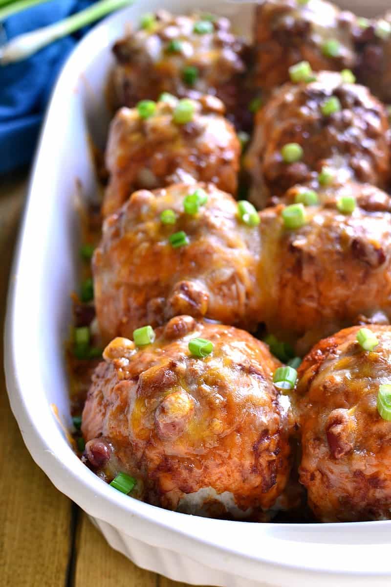 These Chili Cheese Turkey Sliders are packed with turkey and two kinds of cheese, then smothered in chili, cheese, and green onions. Perfect for game day or a quick & easy {make-ahead} weeknight dinner!