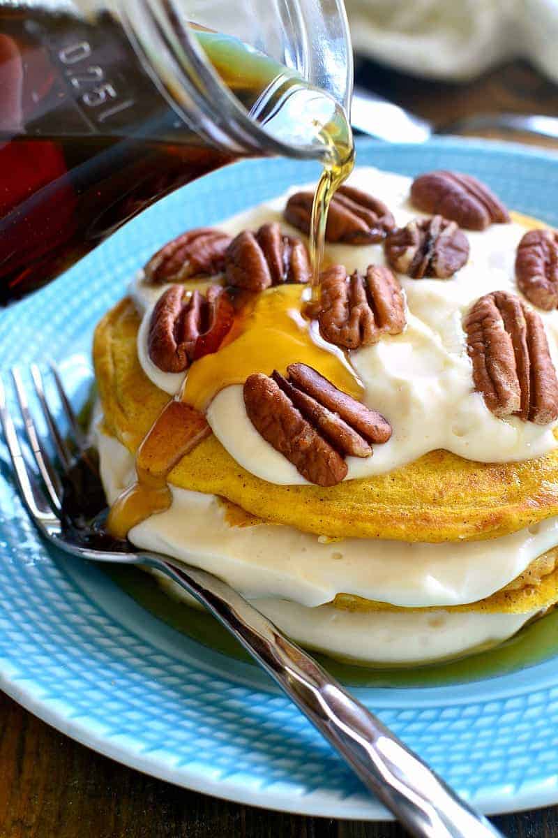 These Pumpkin Cheesecake Pancakes are sure to become your new favorite breakfast treat! Made with real pumpkin and layered with an easy no-bake maple cheesecake filling, they're sweet, flavorful, and perfect for fall!