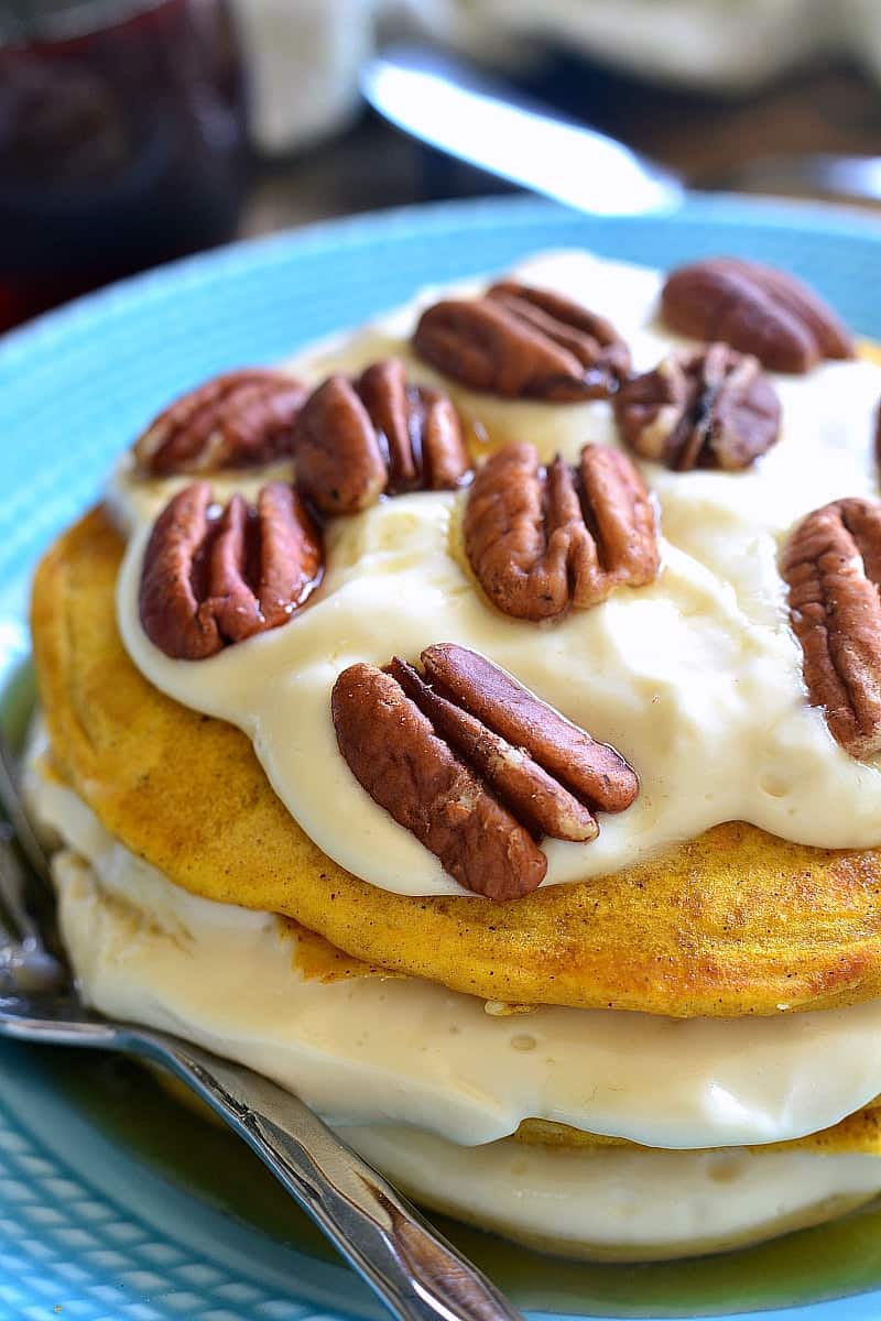 These Pumpkin Cheesecake Pancakes are sure to become your new favorite breakfast treat! Made with real pumpkin and layered with an easy no-bake maple cheesecake filling, they're sweet, flavorful, and perfect for fall!