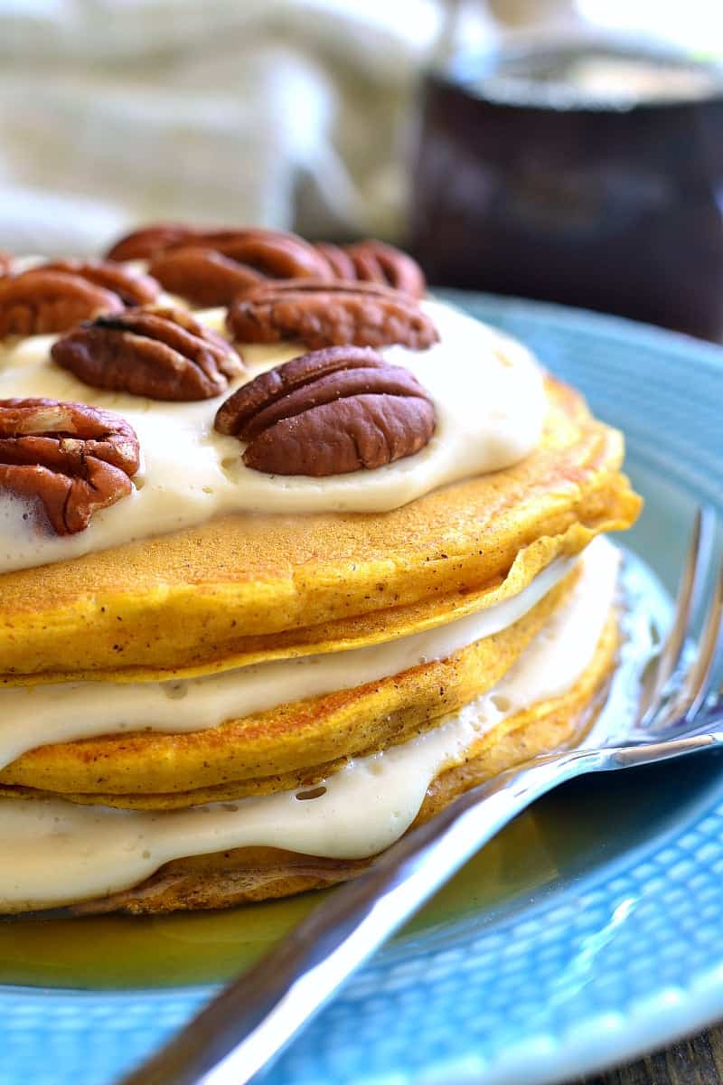 These Pumpkin Cheesecake Pancakes are sure to become your new favorite breakfast treat! Made with real pumpkin and layered with an easy no-bake maple cheesecake filling, they're sweet, flavorful, and perfect for fall!