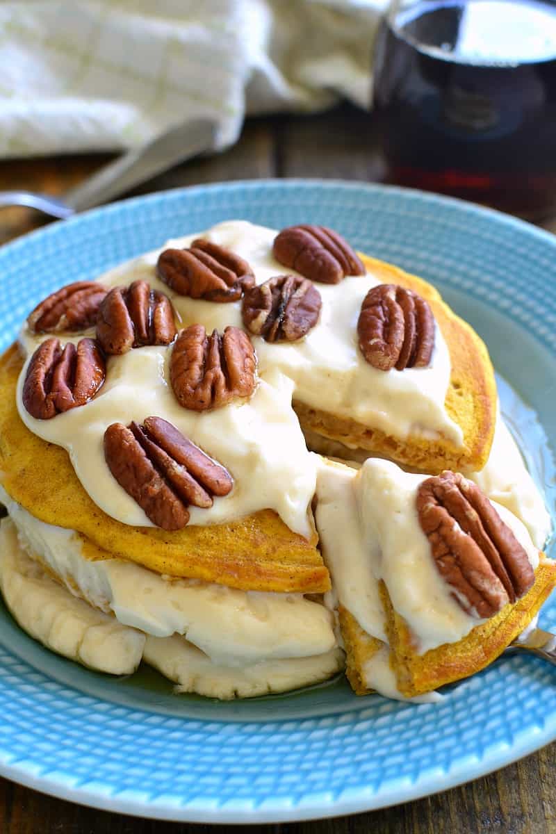 These Pumpkin Cheesecake Pancakes are sure to become your new favorite breakfast treat! Made with real pumpkin and layered with an easy no-bake maple cheesecake filling, they're sweet, flavorful, and perfect for fall!