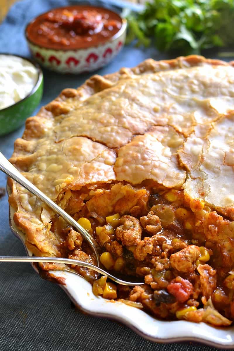 Taco Pot Pie combines two classics in one delicious dish! All the taco flavors you love in a flaky, buttery crust that's sure to become a new family favorite!