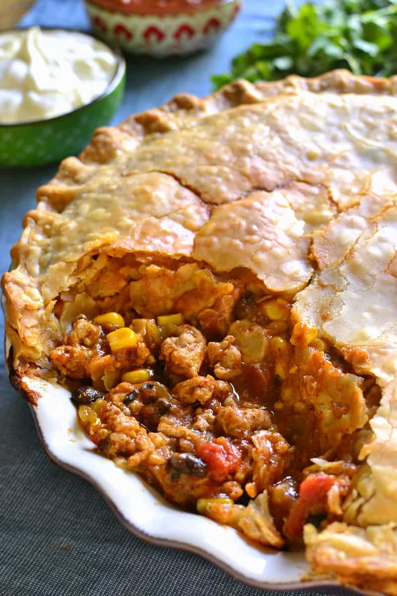 Taco Pot Pie combines two classics in one delicious dish! All the taco flavors you love in a flaky, buttery crust that's sure to become a new family favorite!