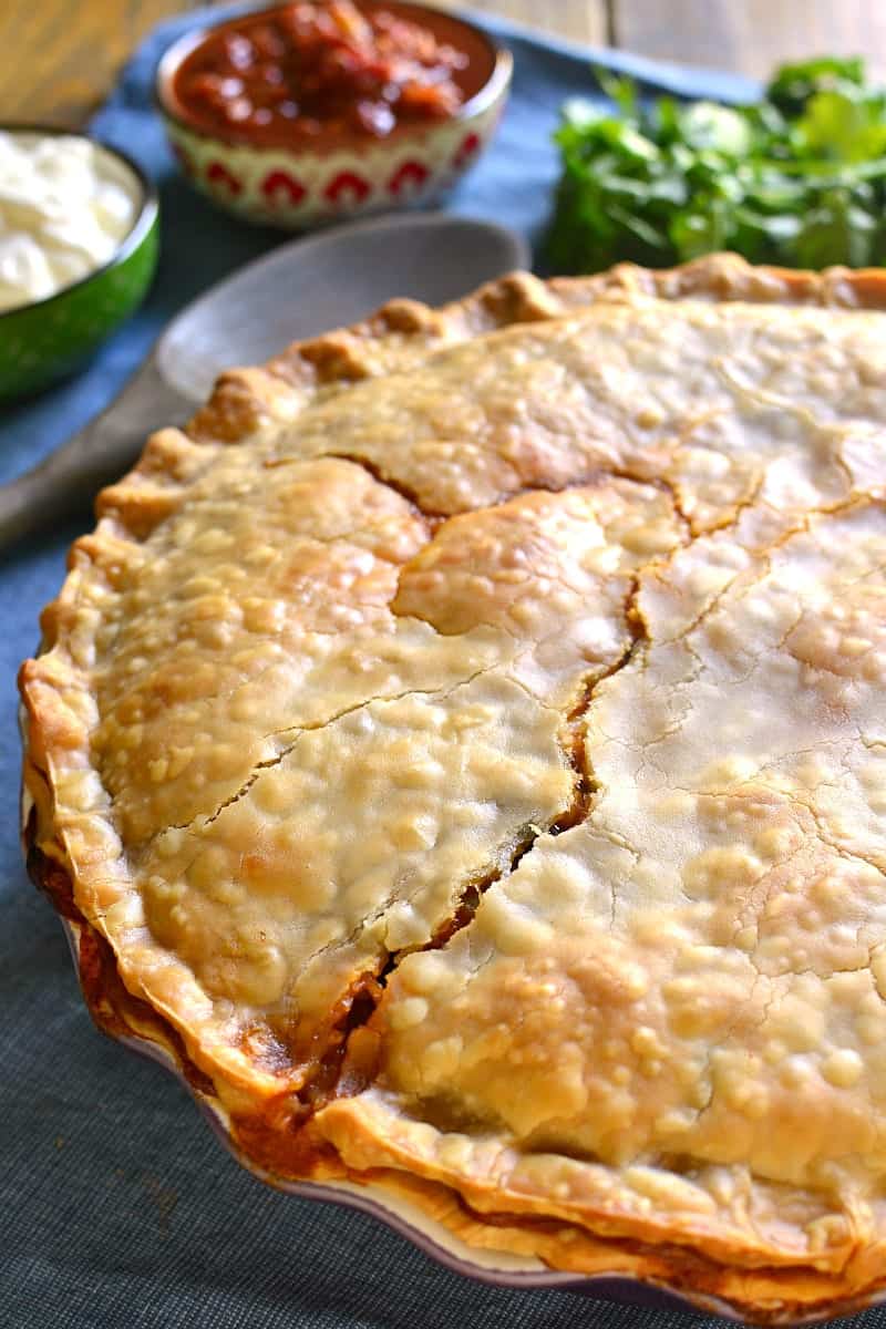 Taco Pot Pie combines two classics in one delicious dish! All the taco flavors you love in a flaky, buttery crust that's sure to become a new family favorite!