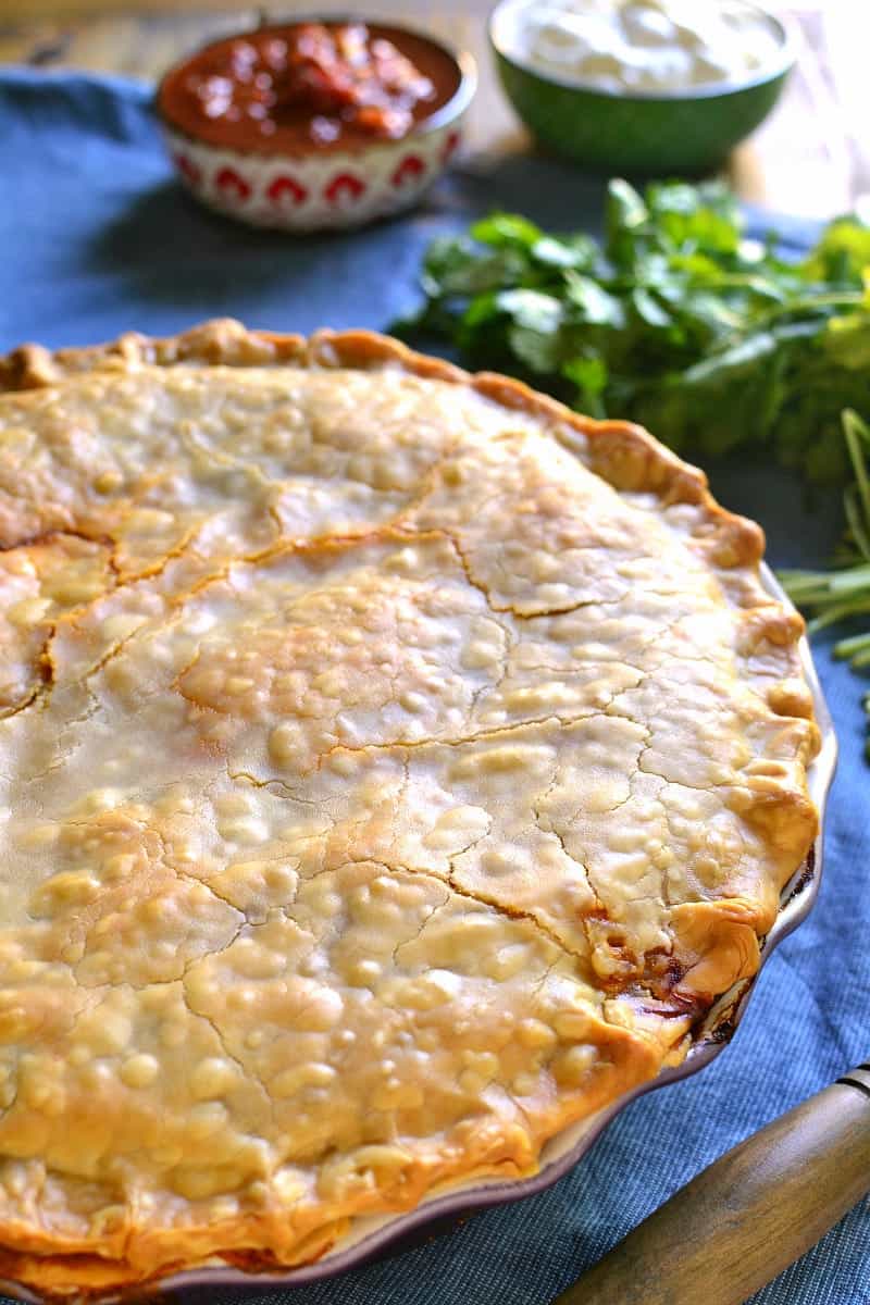 Taco Pot Pie combines two classics in one delicious dish! All the taco flavors you love in a flaky, buttery crust that's sure to become a new family favorite!