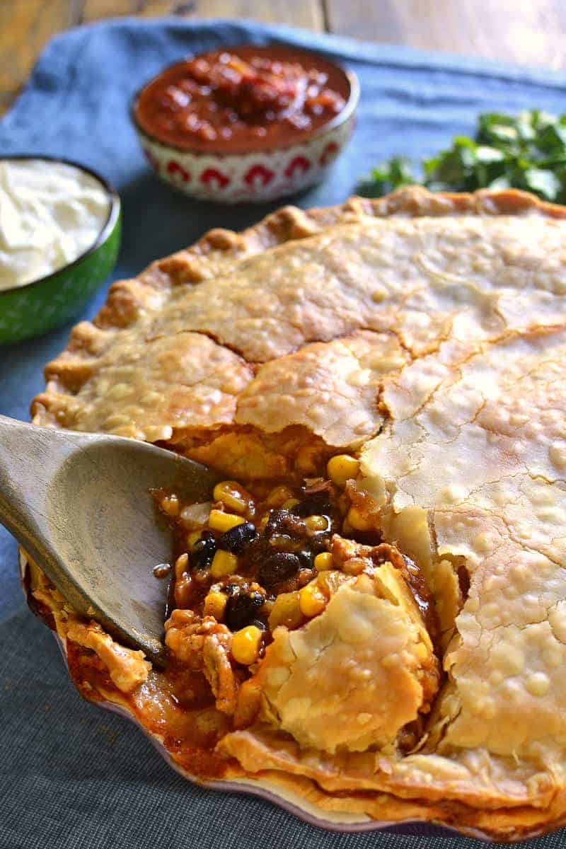 Taco Pot Pie combines two classics in one delicious dish! All the taco flavors you love in a flaky, buttery crust that's sure to become a new family favorite!