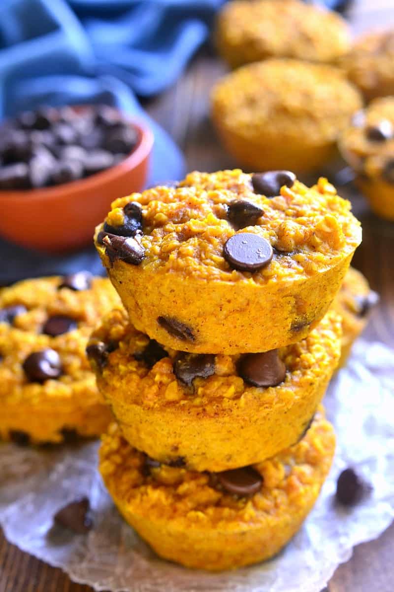 These Pumpkin Chocolate Chip Baked Oatmeal Muffins are just like the delicious baked oatmeal you love...in single serve portions! You'll fall in love with the pumpkin chocolate chip flavor in these yummy fall treats that are perfect for breakfast or snack time!