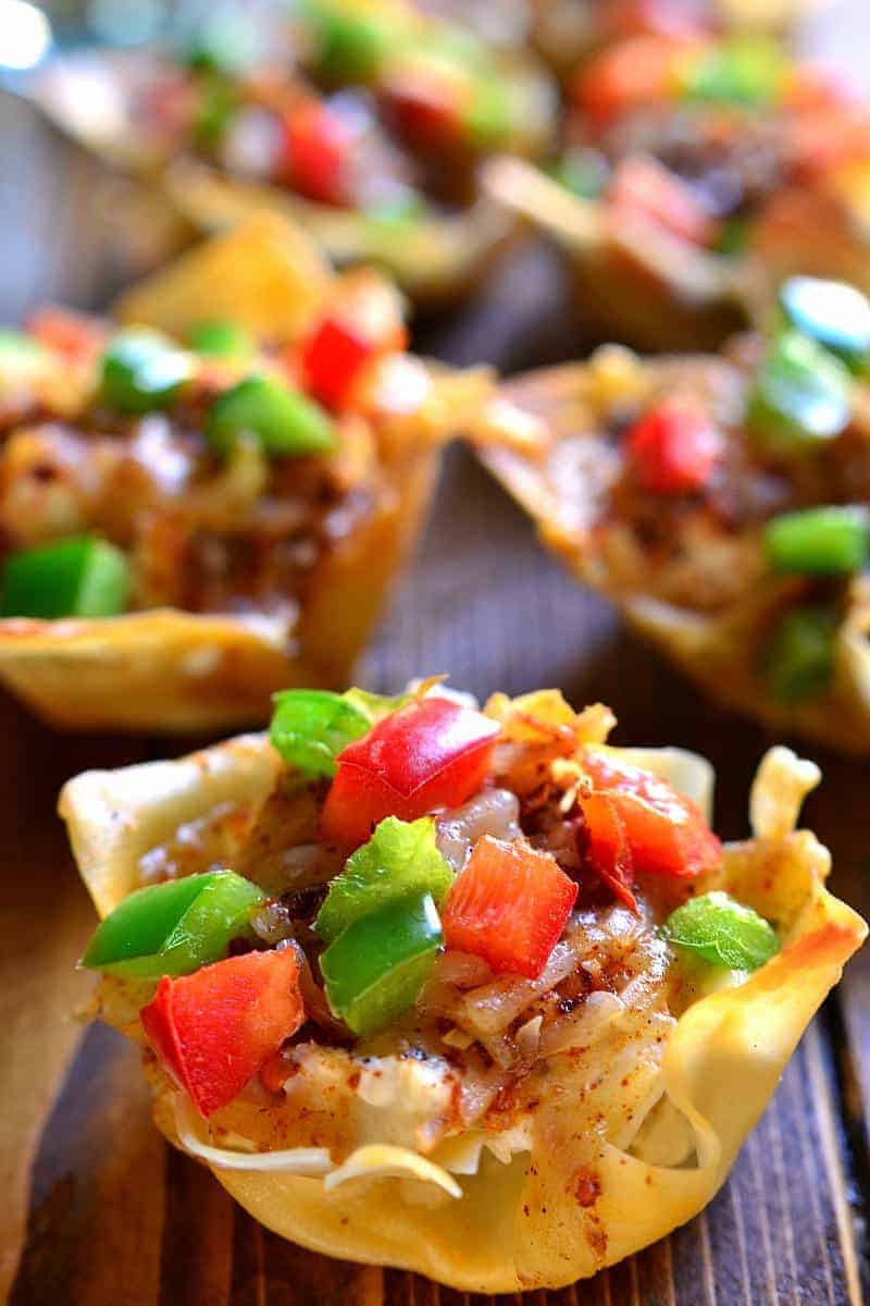 Southwest Chicken Wonton Cups are loaded with creamy chicken, cheese, and peppers and packed with delicious southwest flavor. The perfect holiday appetizer - sure to become a new family favorite!