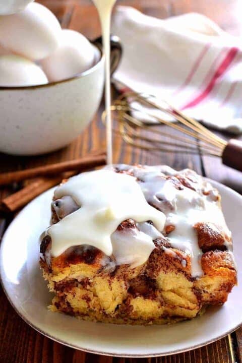 Cinnamon Roll French Toast Casserole takes cinnamon rolls to the next level in an ooey, gooey, delicious baked French toast recipe that's perfect for the holidays!