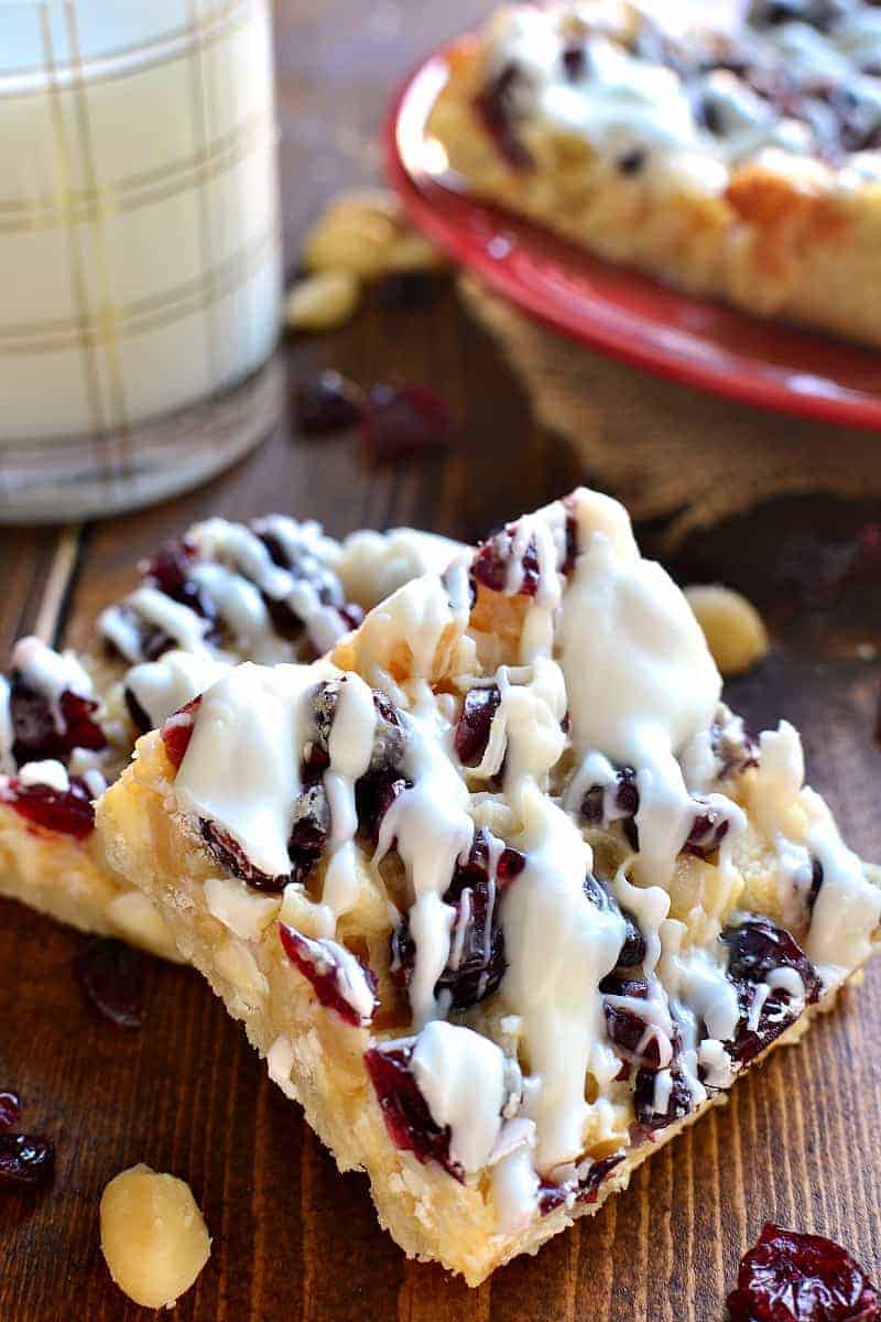 White Chocolate Cranberry Macadamia Magic Bars are a great way to take your Christmas treats to the next level! An easy dessert recipe with just 6 ingredients is perfect for the holidays!