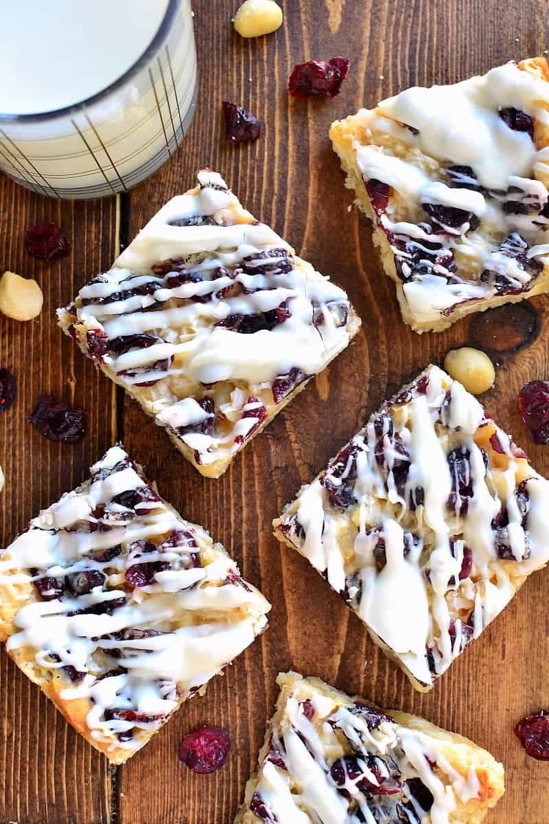 White Chocolate Cranberry Macadamia Magic Bars are a great way to take your Christmas treats to the next level! An easy dessert recipe with just 6 ingredients is perfect for the holidays!