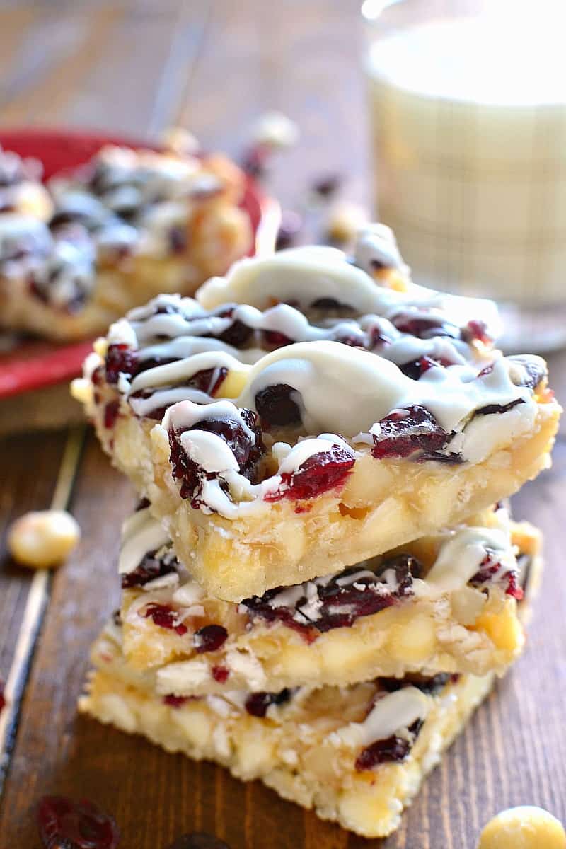 White Chocolate Cranberry Macadamia Magic Bars are a great way to take your Christmas treats to the next level! An easy dessert recipe with just 6 ingredients is perfect for the holidays!