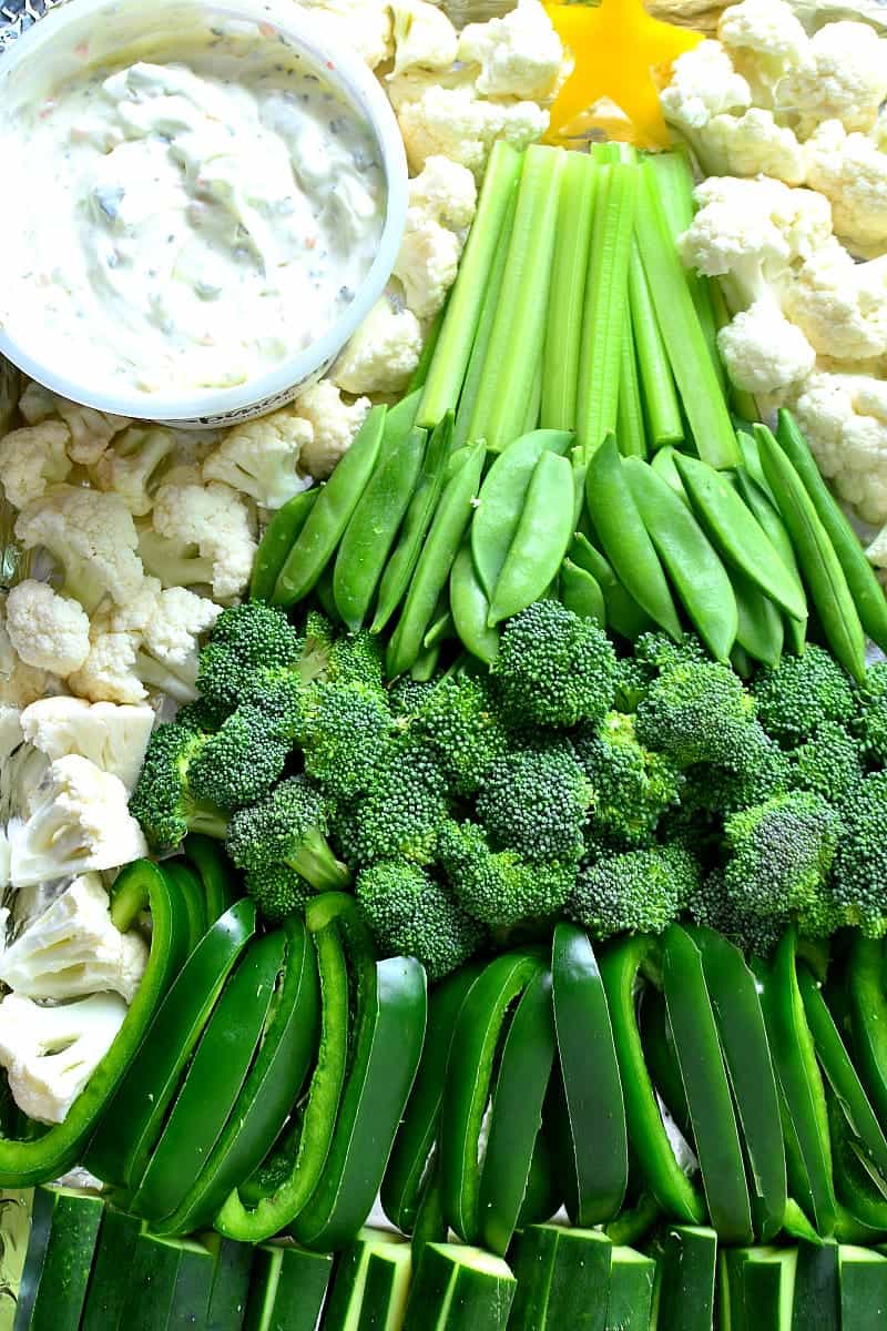 This Holiday Veggie Tray comes together quickly with just a handful of fresh vegetables and Marzetti Veggie Dips! Perfect for holiday parties and sure to be a hit!