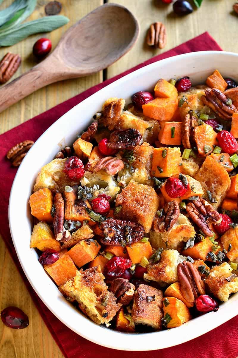 A whole new take on stuffing! This Sweet Potato Cranberry Pecan Stuffing is a little bit sweet, a little bit savory, and the perfect addition to your Thanksgiving or Christmas table!