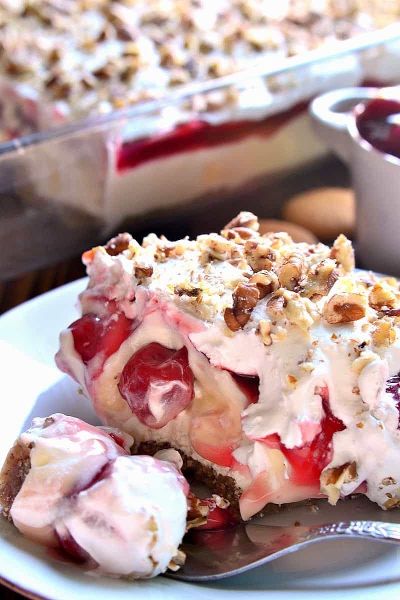 This Cherry Cheesecake Lush Dessert combines all the flavors of cherry cheesecake with the creaminess of lush! The perfect dessert for the holidays and all year round!