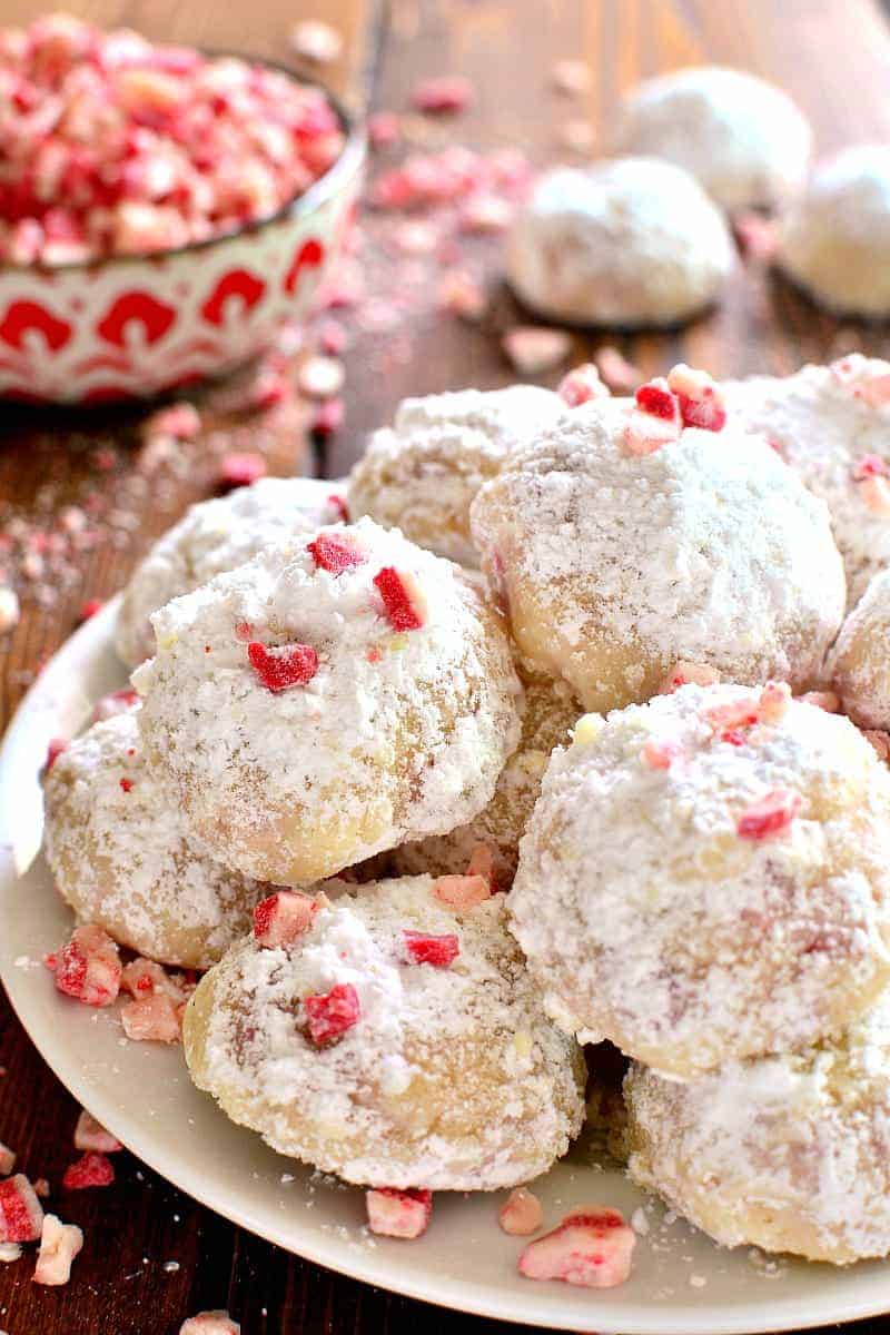 Peppermint Snowballs are the perfect holiday twist on a classic! Packed with delicious peppermint flavor and just the right amount of crunch, these cookies are a must make for all your holiday baking!