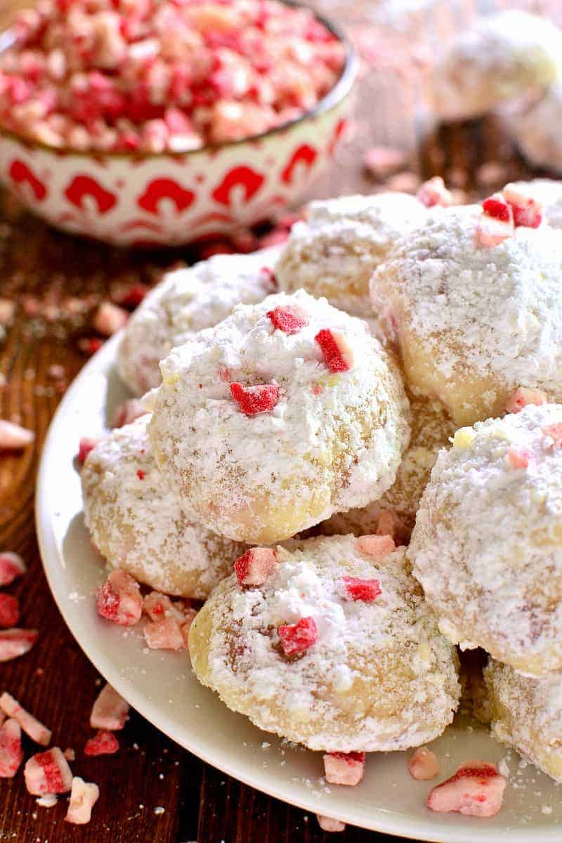 Peppermint Snowballs are the perfect holiday twist on a classic! Packed with delicious peppermint flavor and just the right amount of crunch, these cookies are a must make for all your holiday baking!