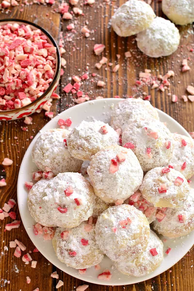 Peppermint Snowballs are the perfect holiday twist on a classic! Packed with delicious peppermint flavor and just the right amount of crunch, these cookies are a must make for all your holiday baking!