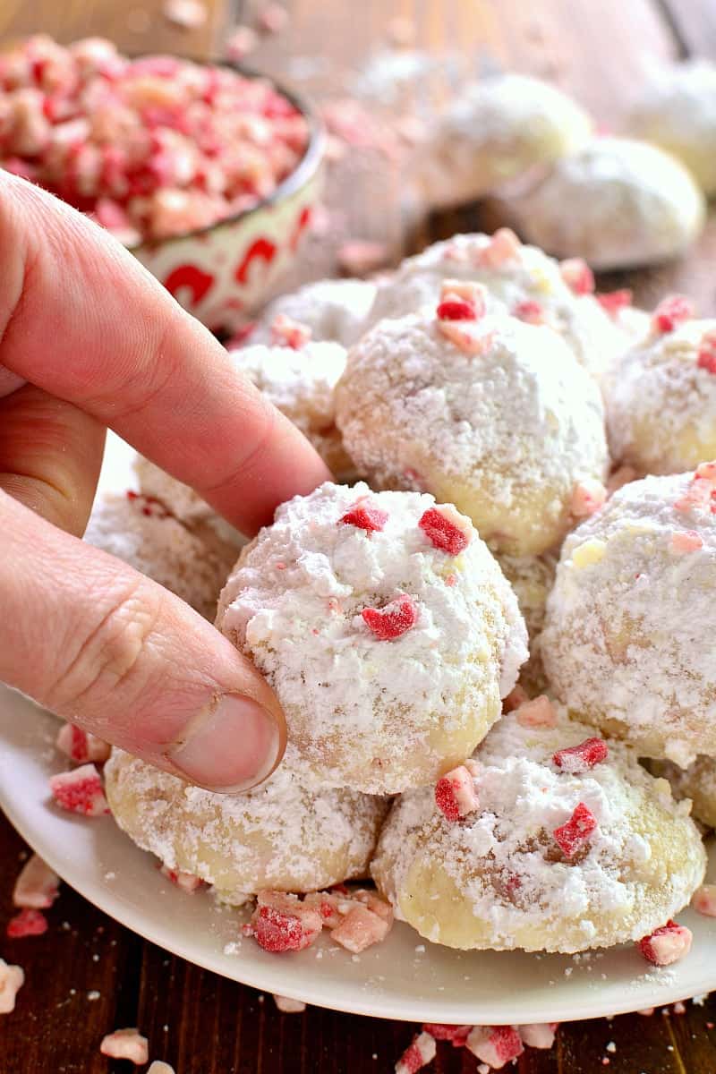 Peppermint Snowballs are the perfect holiday twist on a classic! Packed with delicious peppermint flavor and just the right amount of crunch, these cookies are a must make for all your holiday baking!